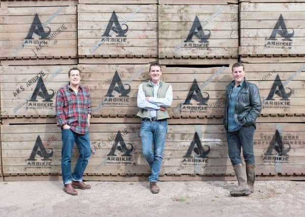 Brothers Iain, John and David Stirling at the Arbikie Distillery. The trio have just launched their own vodka. Picture: PA