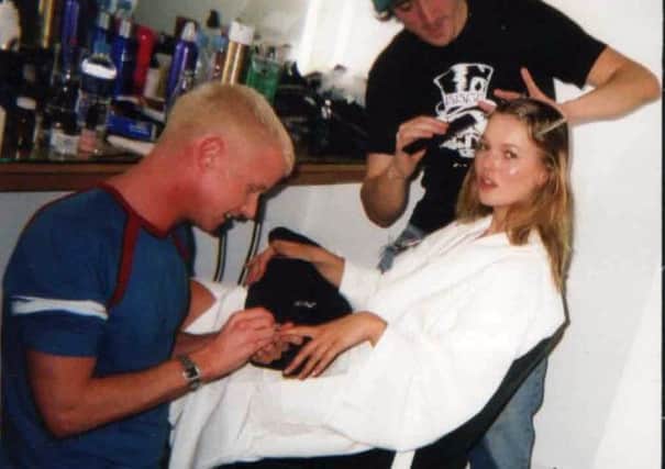 Leighton Denny giving Kate Moss a manicure. Picture: Contributed