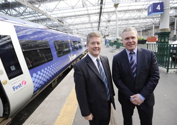 Transport Minister Keith Brown and Abellio CEO Jeff Hoogesteger at the announcement. Picture: Greg Macvean
