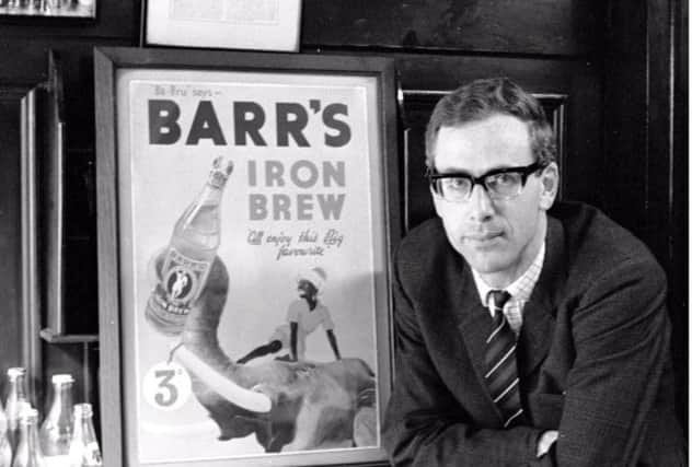 Robin Barr with an old 'Iron Brew' promotional poster, in 1971. Picture: TSPL