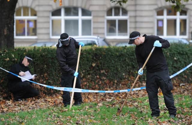 Police officers search Leith Links. Picture: Neil Hanna
