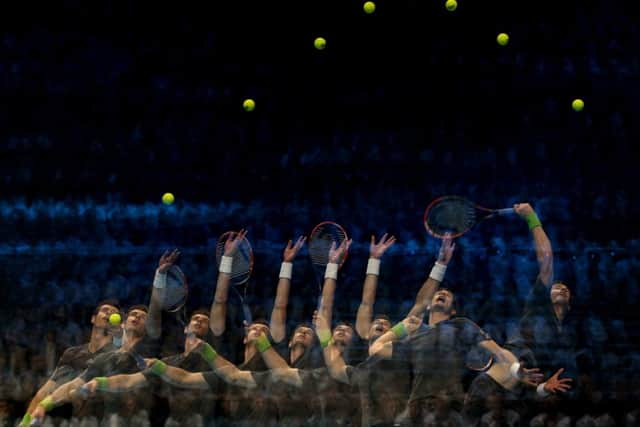 Andy Murray is seen serving during  his 60, 61 defeat to Roger Federer. Picture: Getty