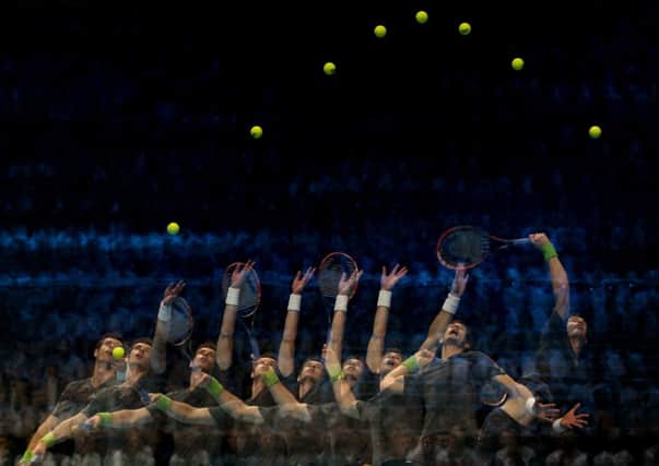 Andy Murray is seen serving during  his 60, 61 defeat to Roger Federer. Picture: Getty