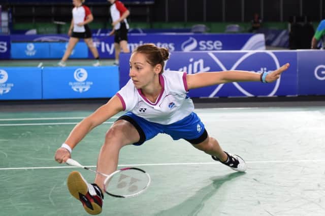 Kirsty Gilmour in action in the Commonwealth Games singles at the Emirates Arena and, below, showing off the silver medal that she won in Glasgow. Picture: Lorraine Hill