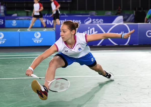 Kirsty Gilmour in action in the Commonwealth Games singles at the Emirates Arena and, below, showing off the silver medal that she won in Glasgow. Picture: Lorraine Hill