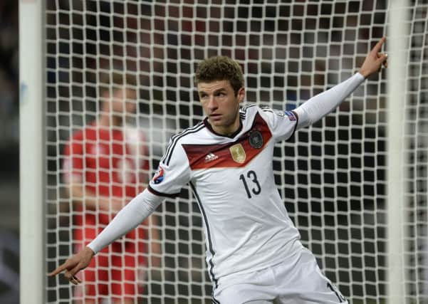 Thomas Mueller celebrates after putting Germany 2-0 up. Picture: Getty