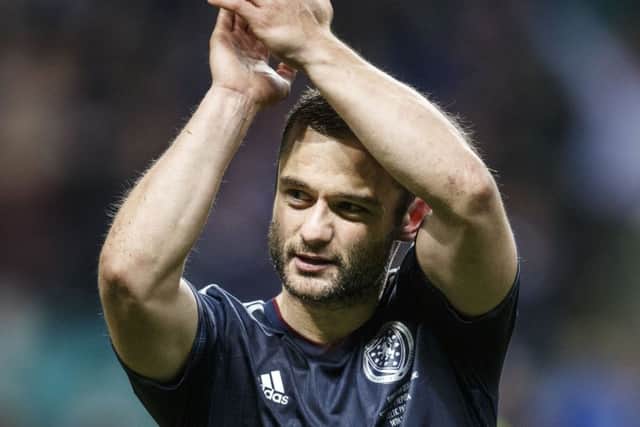 Scotlands hero Shaun Maloney applauds the Celtic Park fans after the final whistle. Picture: Robert Perry