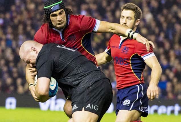 Blair Cowan tries to strip the ball away from All Black Ben Franks with Greig Laidlaw in support. Photograph: Craig Watson/SNS/SRU