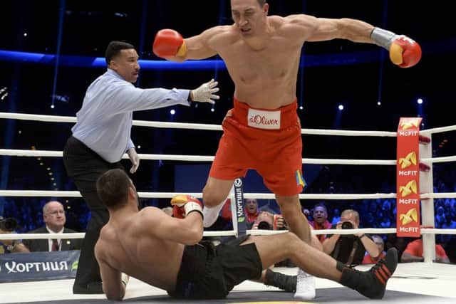 Wladimir Klitschko knocks down challenger Kubrat Pulev during Saturday nights title fight. Picture: Reuters