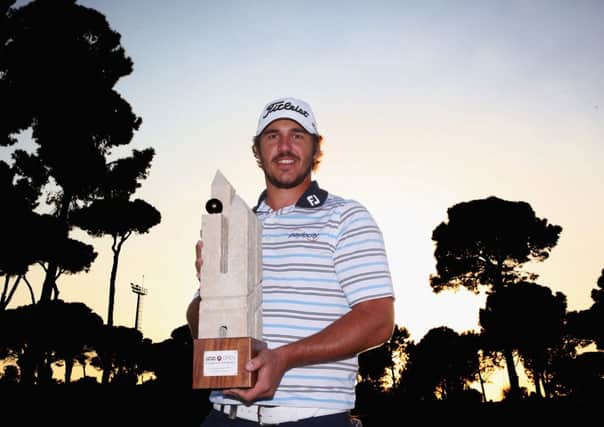 Brooks Koepka celebrates with the trophy after winning the Turkish Airlines Open. Picture: Getty