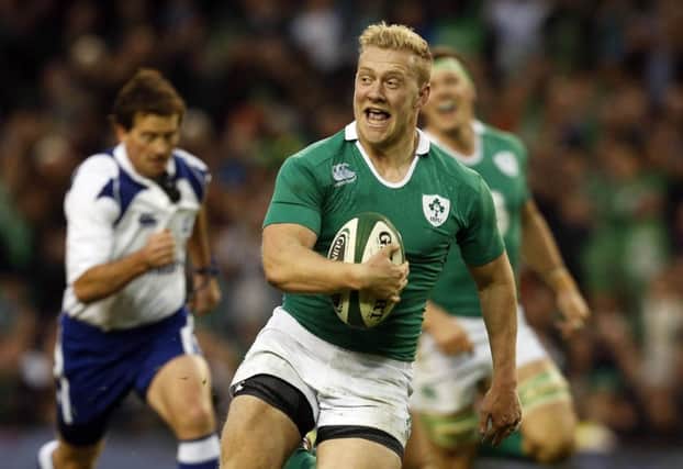 Stuart Olding prepares to celebrate as he crosses the line for Ireland. Picture: Reuters