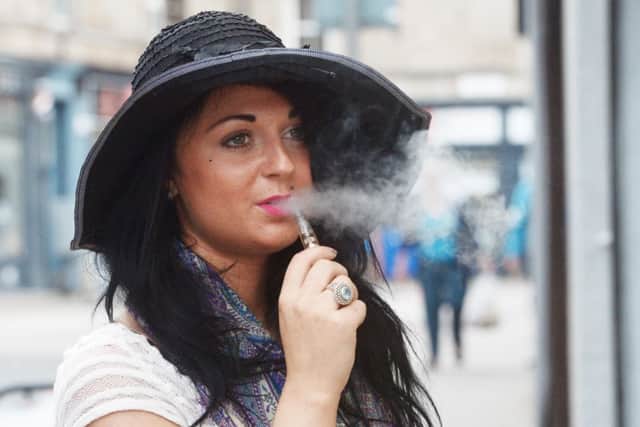 To vape: The act of using an electronic cigarette. Picture: TSPL