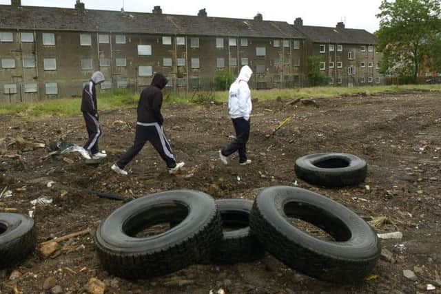 Youths hang around in Drumchapel. This housing scheme is one of the most deprived in the country. 
Picture Robert Perry.