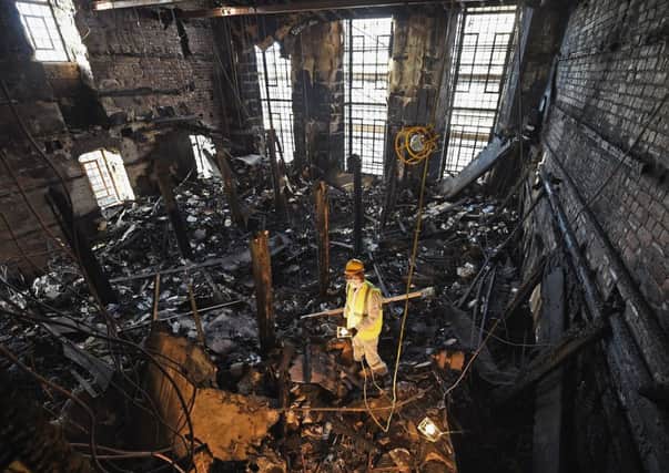 Yesterday was the first day the library was safe enough for archaeologists to enter. Picture: Getty