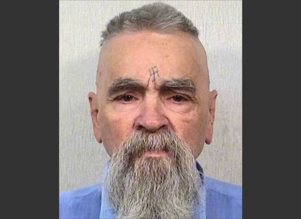 Afton Elaine Burton, 26, said she and  Charles Manson, 80, will marry next month. Picture: AP