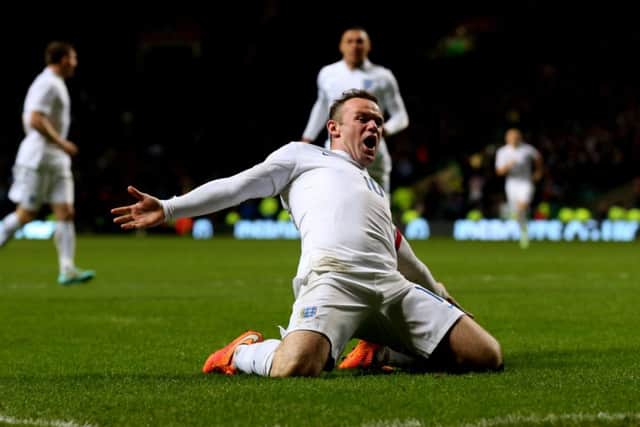 Captain Wayne Rooney celebrates scoring England's second goal. Picture: Getty