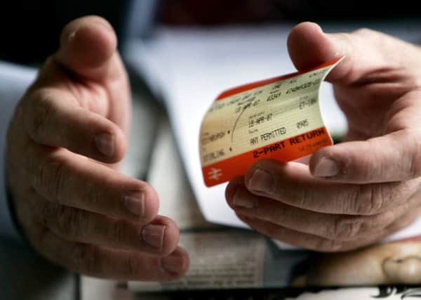Paper tickets for rail journeys in Scotland will be gradually replaced by smartcards. Picture: Reuters