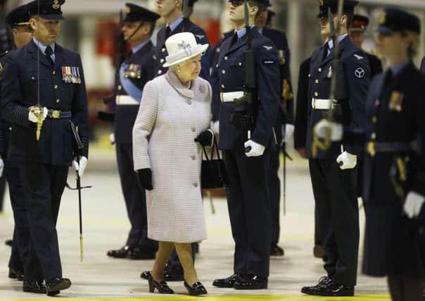 Queen Elizabeth II during an inspection of  personnel from No 1 (Fighter) Squadron as she visits RAF Lossiemouth. Picture: PA