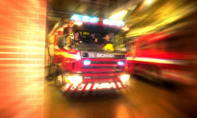 The blaze started in the roof of a three-storey building in Morgan Street. Picture: TSPL