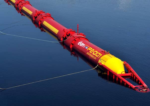 A Pelamis wave power device docked in Leith. Picture: Jane Barlow
