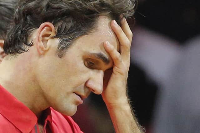 A half-fit Roger Federer lost 6-1 6-4 6-3 to Gael Monfils in Lille. Picture: AP
