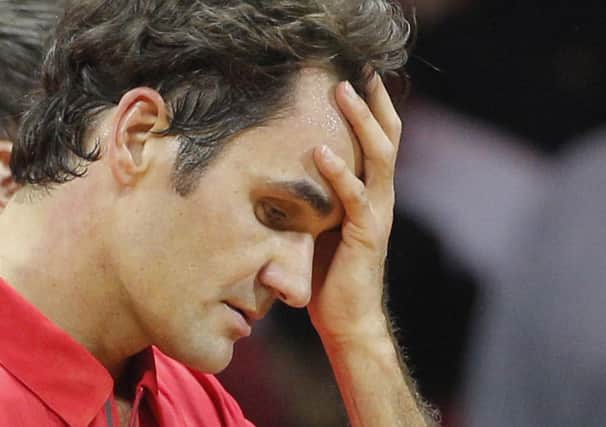 A half-fit Roger Federer lost 6-1 6-4 6-3 to Gael Monfils in Lille. Picture: AP