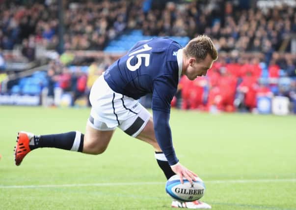 Stuart Hogg scores a try against Tonga at Rugby Park. Picture: SNS
