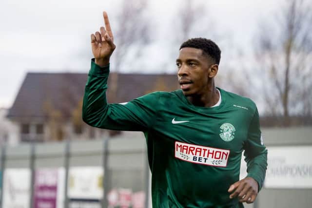 Fresh from international duty, Dominique Malonga celebrates scoring for Hibs. Picture: SNS
