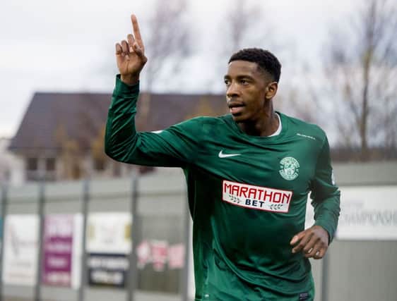 Fresh from international duty, Dominique Malonga celebrates scoring for Hibs. Picture: SNS