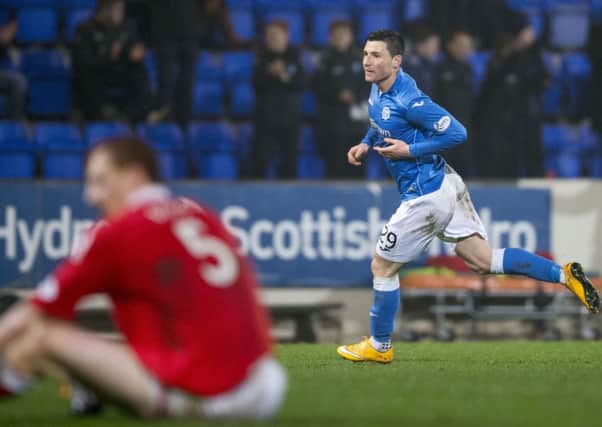 Michael O'Halloran wheels away after scoring what turned out to be the winner. Picture: SNS