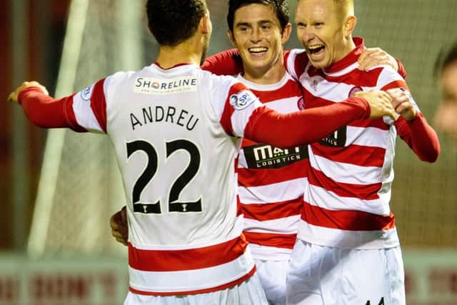 Hamiltons Ali Crawford, right, celebrates his goal with team-mates. Picture: SNS