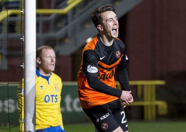 Dundee United substitute Aidan Connolly celebrates after his late goal. Picture: SNS