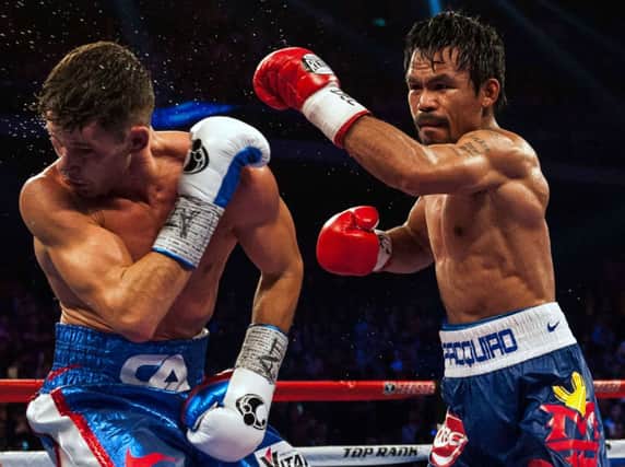 Manny Pacquiao dominated Chris Algieri, knocking him down six times. Picture: Getty