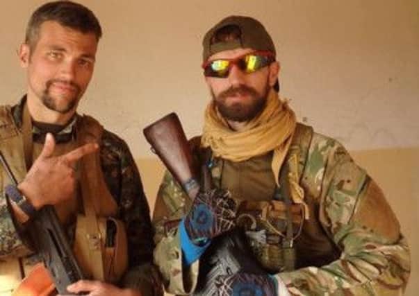 Jamie Read from Lanarkshire, right, with former US soldierJordan Matson, in an image posted on social media