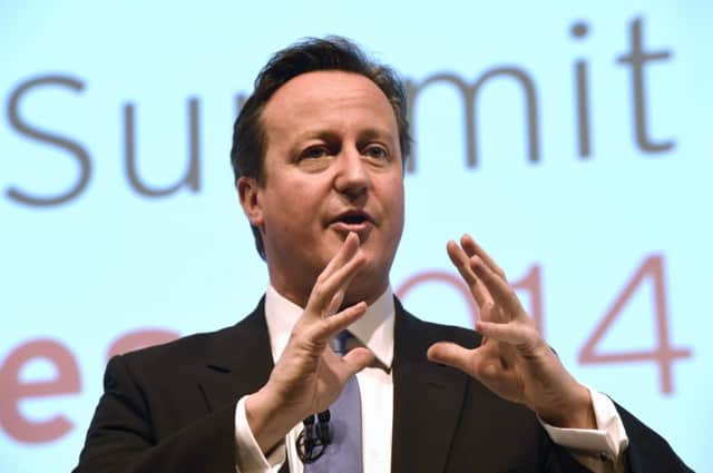 David Cameron is said to be considering a block on benefits for new arrivals. Picture: Reuters