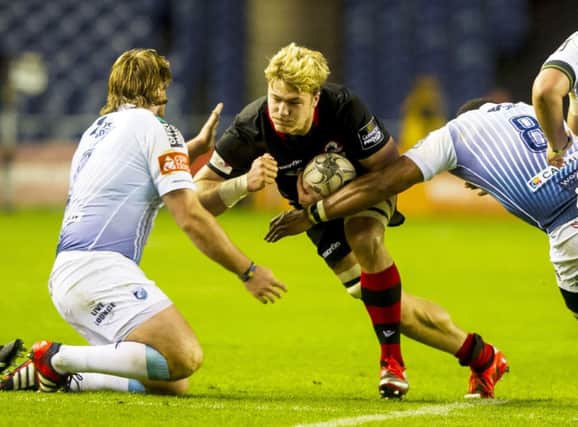 David Denton makes ground for Edinburgh in a heartening return to action for the capital side. Picture: SNS