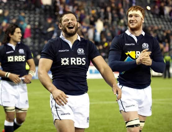 Ross Ford (left) and Rob Harley are all smiles after Scotland's win. Picture: SNS
