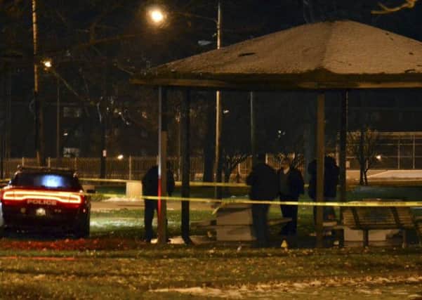 Cleveland police investigate the scene after an officer fired two shots, killing 12-year-old Tamir Rice. Picture: AP