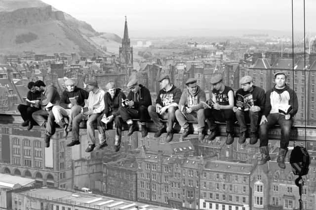 Workers from Had-Fab recreate 'Lunch Atop a Skyscraper' to promote Book Week Scotland. Picture: Rob McDougall