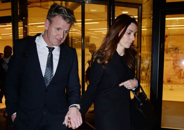 Chef Gordon Ramsay leaves the High Court in London with his wife Tana. Picture: PA