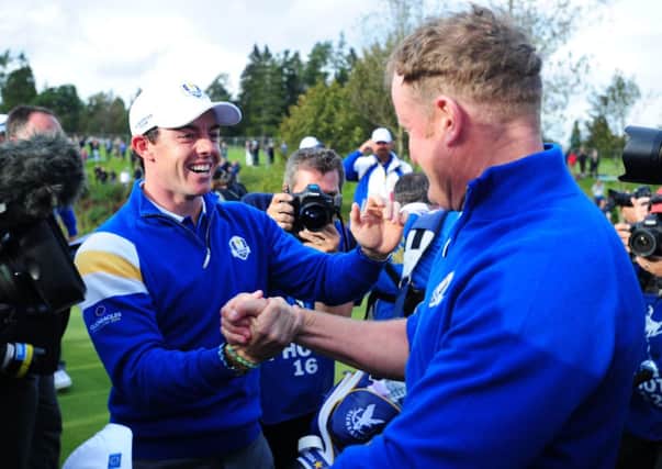 Rory McIlroy celebrates with Jamie Donaldson during this year's Ryder Cup at Gleneagles. Picture: Ian Rutherford