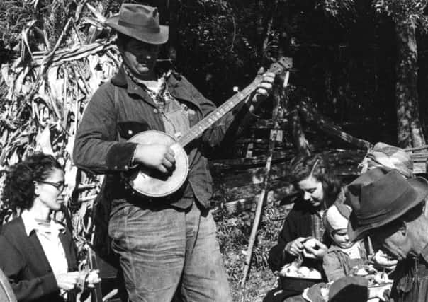 The staple of bluegrass, the banjo, is traced back to the arrival of slaves in America. Picture: Getty