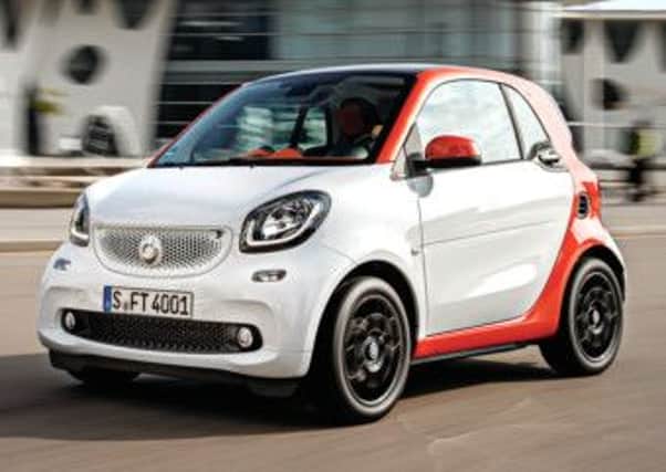 The Smart ForTwo squeezes into city-centre parking spaces other cars can't reach