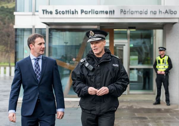 Chief Constable Sir Stephen House and justice secretary Michael Matheson have urged the Treasury to change its position. Picture: Ian Georgeson