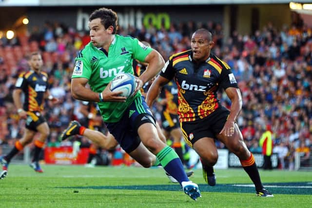 John Hardie, in possession for New Zealand club Highlanders, is believed to have attracted attention from the SRU. Picture: Getty