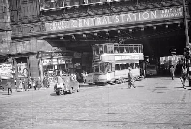A tram leaves the entrance to Glasgow Central Station on April 4, 1958. Picture: TSPL