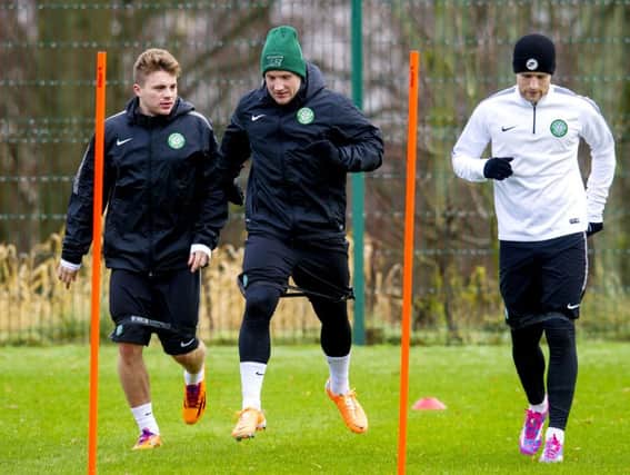 James Forrest, Kris Commons and Adam Matthews train ahead of Celtic's game against Red Bull Salzburg. Picture: SNS