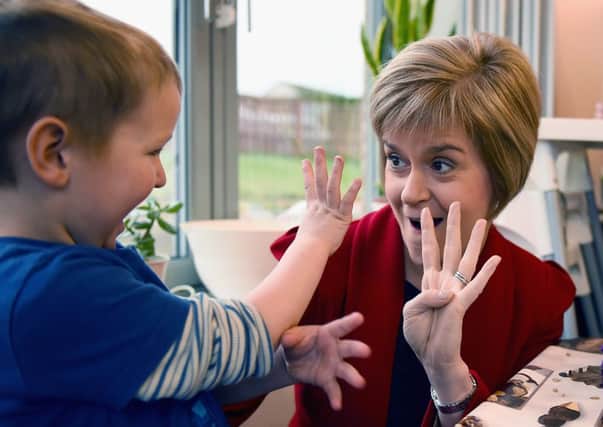 The First Minister during a visit to The Kabin community learning centre yesterday. Picture: Getty