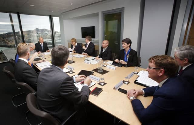Lord Smith (back centre) headed the commission in Edinburgh. Picture: PA