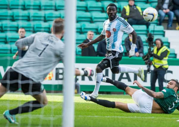 Prince Buaben in action against Hibs. Picture: Ian Georgeson